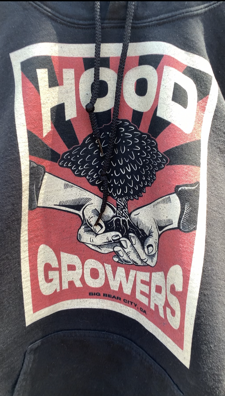 close up of Hood Growers Hoodie logo